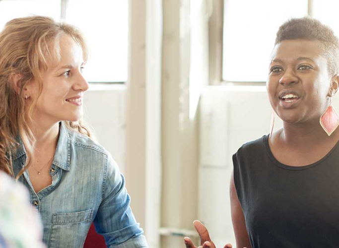 two females sharing their stories